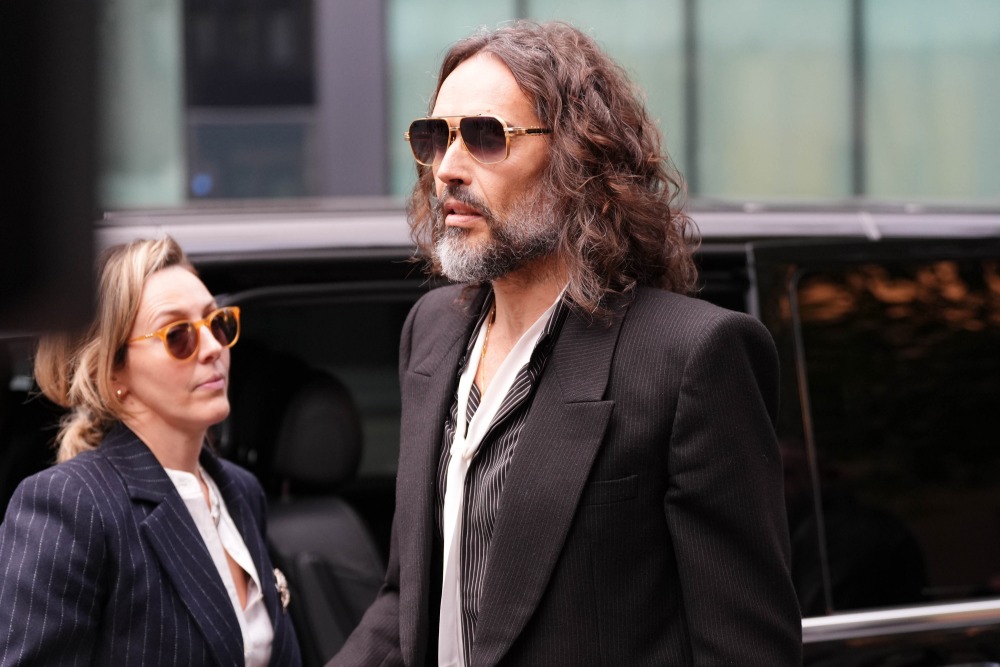 Russell Brand Trial: Prosecution Says He Was ‘Ruthless and Calculated’ in Opening Statement