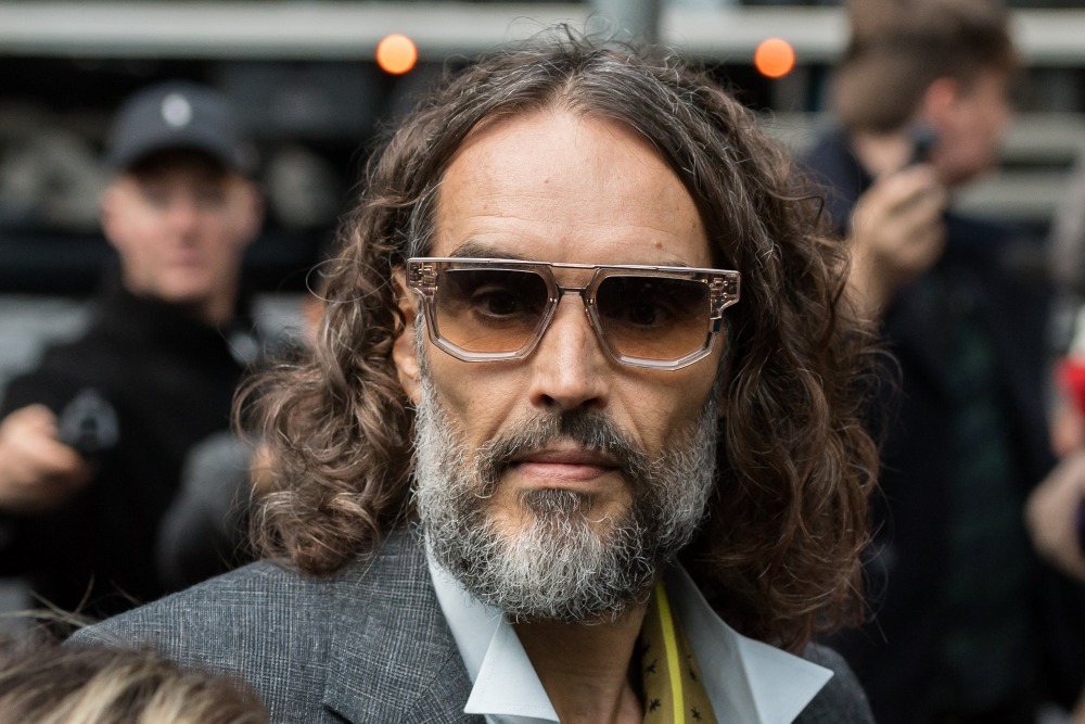 Russell Brand Trial: Third Accuser Says He Grinned "Like a Clown" Before Alleged 2004 Assault