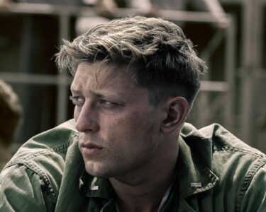 Tom Francis on Singing in The Mosquito Bowl at the Last Minute and Its 'Visceral and Intense' WWII Scenes