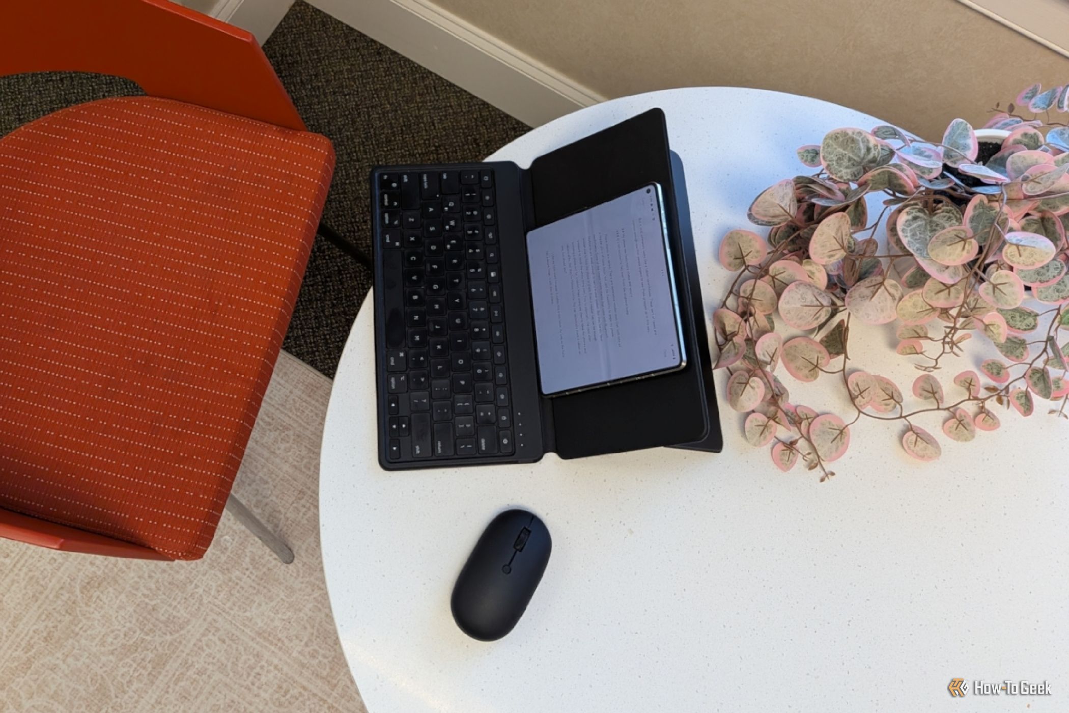 Typing on Your Phone? You Need a Bluetooth Keyboard With a Built-In Stand